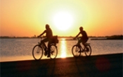 A photo of cycling in Formentera at sunset by lake